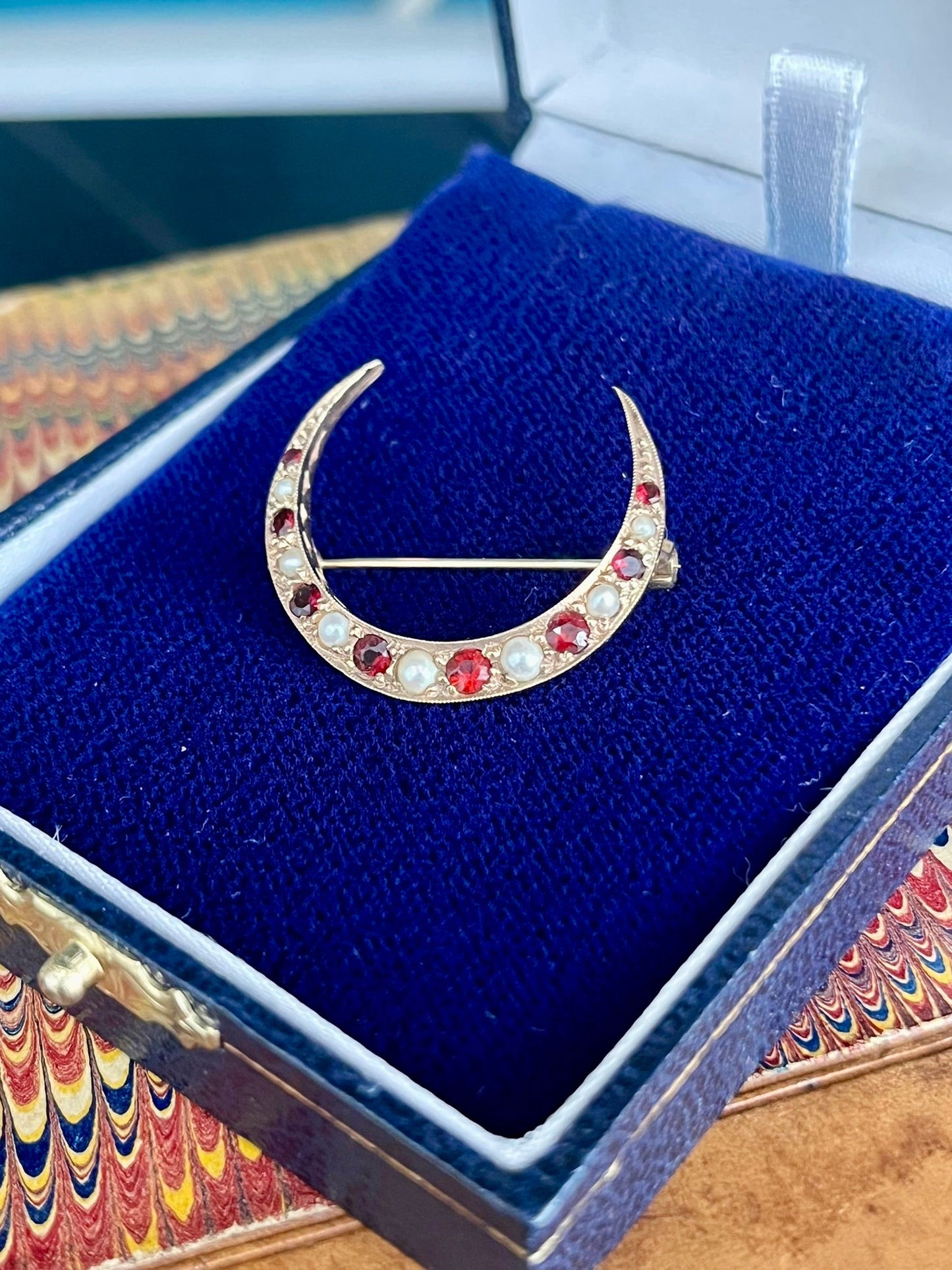 Antique 9ct gold ruby and pearl crescent brooch