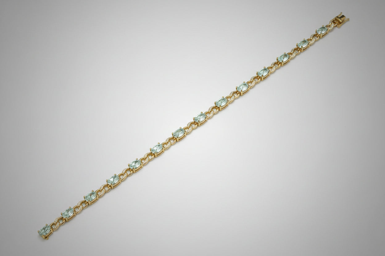 Stunning 9ct gold, blue topaz and diamond bracelet