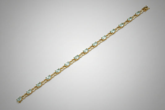 Stunning 9ct gold, blue topaz and diamond bracelet