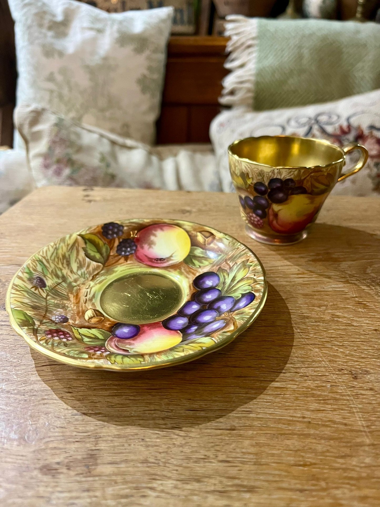 Beautiful pair of Aynsley Orchard Gold cups and saucers in mint condition, signed N. Brunt