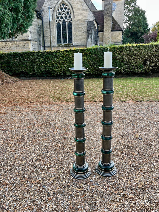Impressive pair of 1950s Hollywood Regency chromed metal and green glass floor standing torcheres
