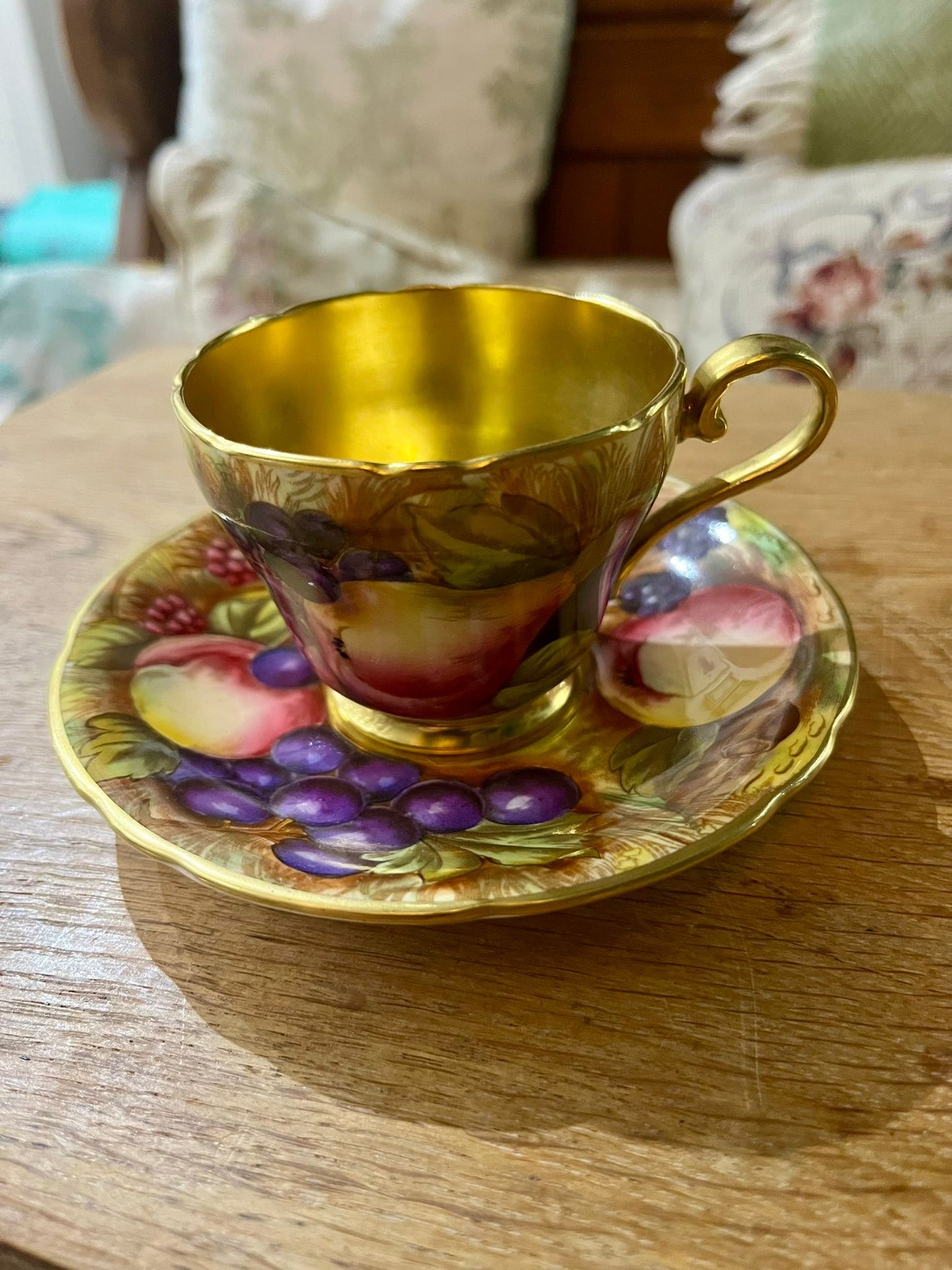 Beautiful pair of Aynsley Orchard Gold cups and saucers in mint condition, signed N. Brunt