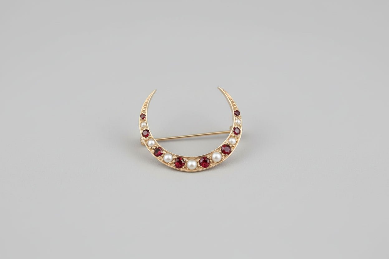 Antique 9ct gold ruby and pearl crescent brooch