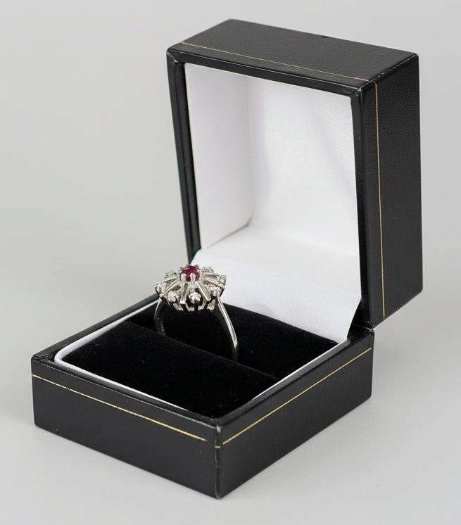 Beautiful 18ct white gold, ruby and diamond starburst ring