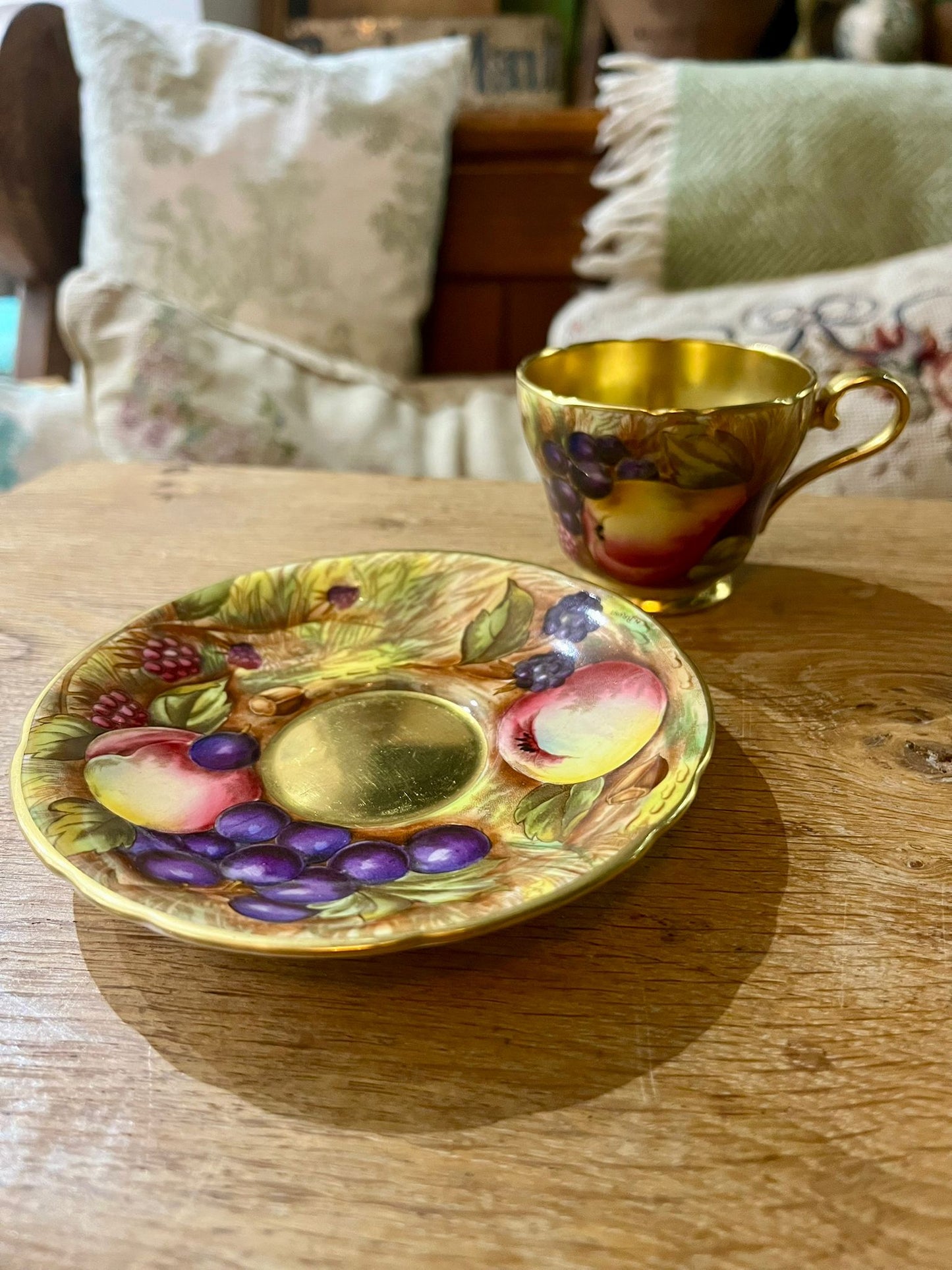 Beautiful pair of Aynsley Orchard Gold cups and saucers in mint condition, signed N. Brunt