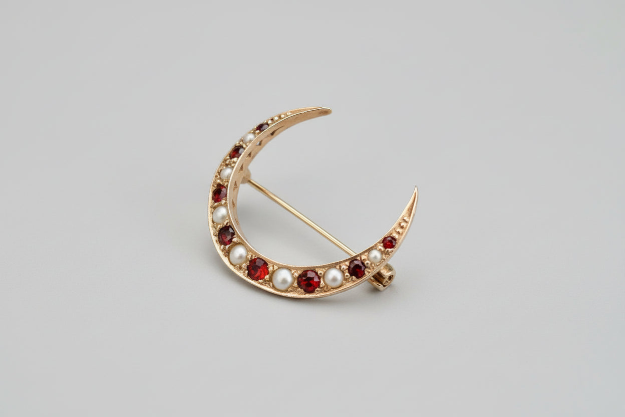 Antique 9ct gold ruby and pearl crescent brooch
