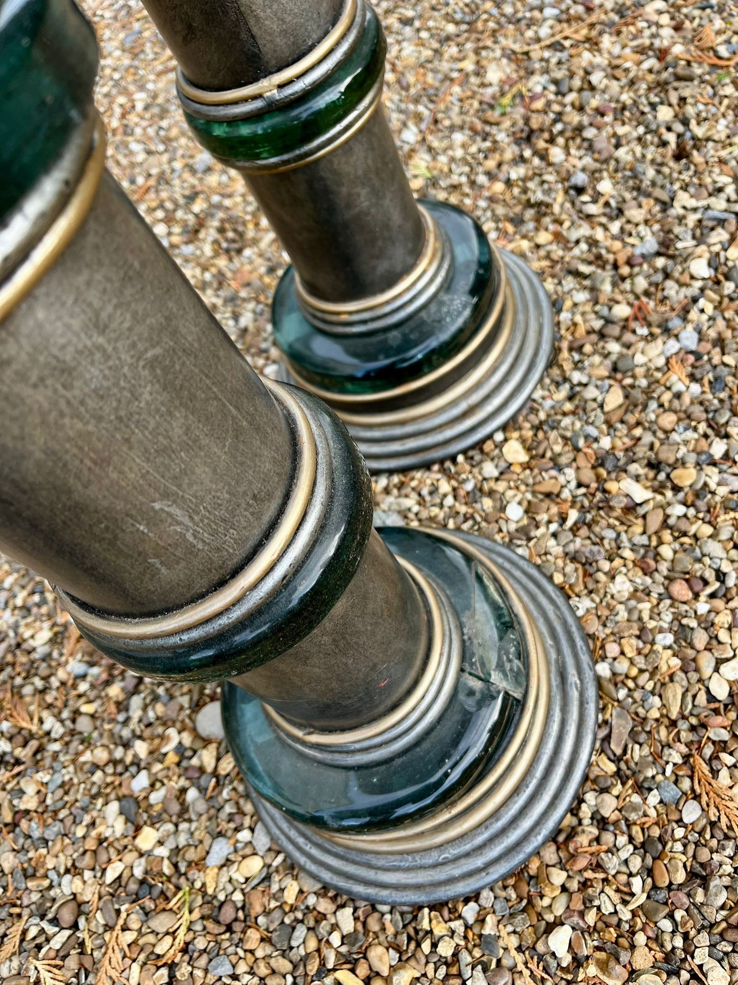 Impressive pair of 1950s Hollywood Regency chromed metal and green glass floor standing torcheres